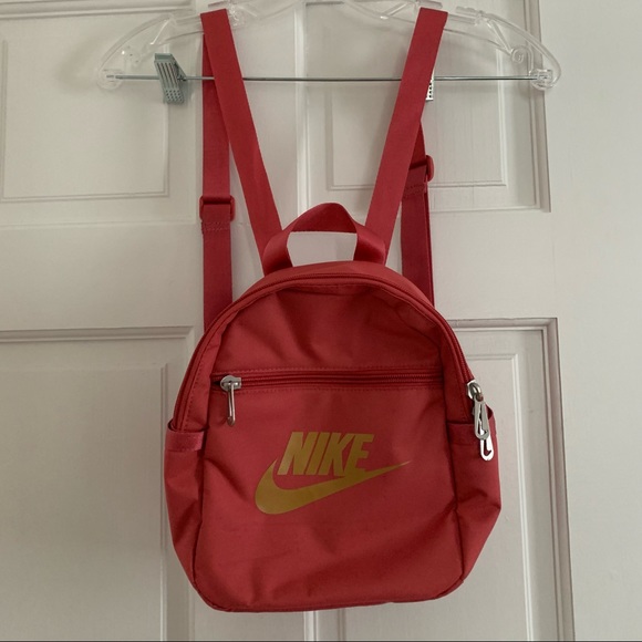 Nike Handbags - Nike Pink Mini Backpack with Gold Logo NWOT